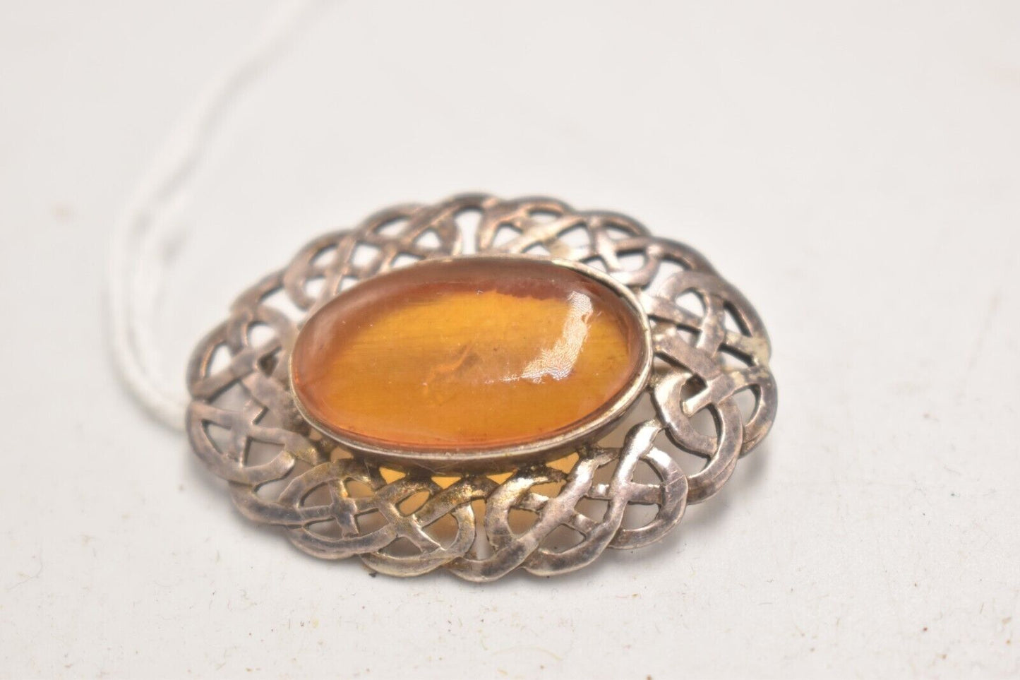 Vintage Celtic Oval Baltic Amber Brooch – Silver-Coloured Setting