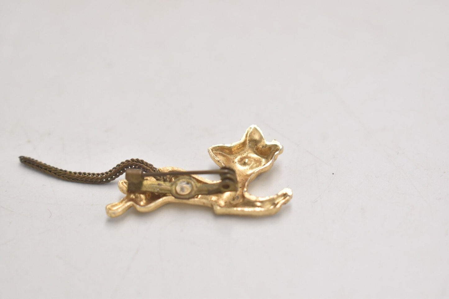 Vintage Cat Brooch Gold Tone with Topaz Blue Eyes - Costume Jewellery