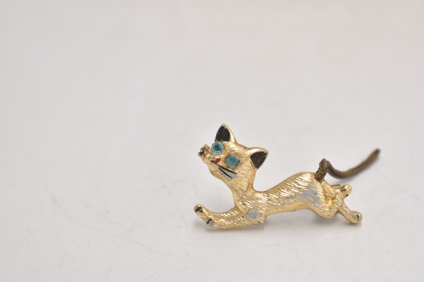 Vintage Cat Brooch Gold Tone with Topaz Blue Eyes - Costume Jewellery