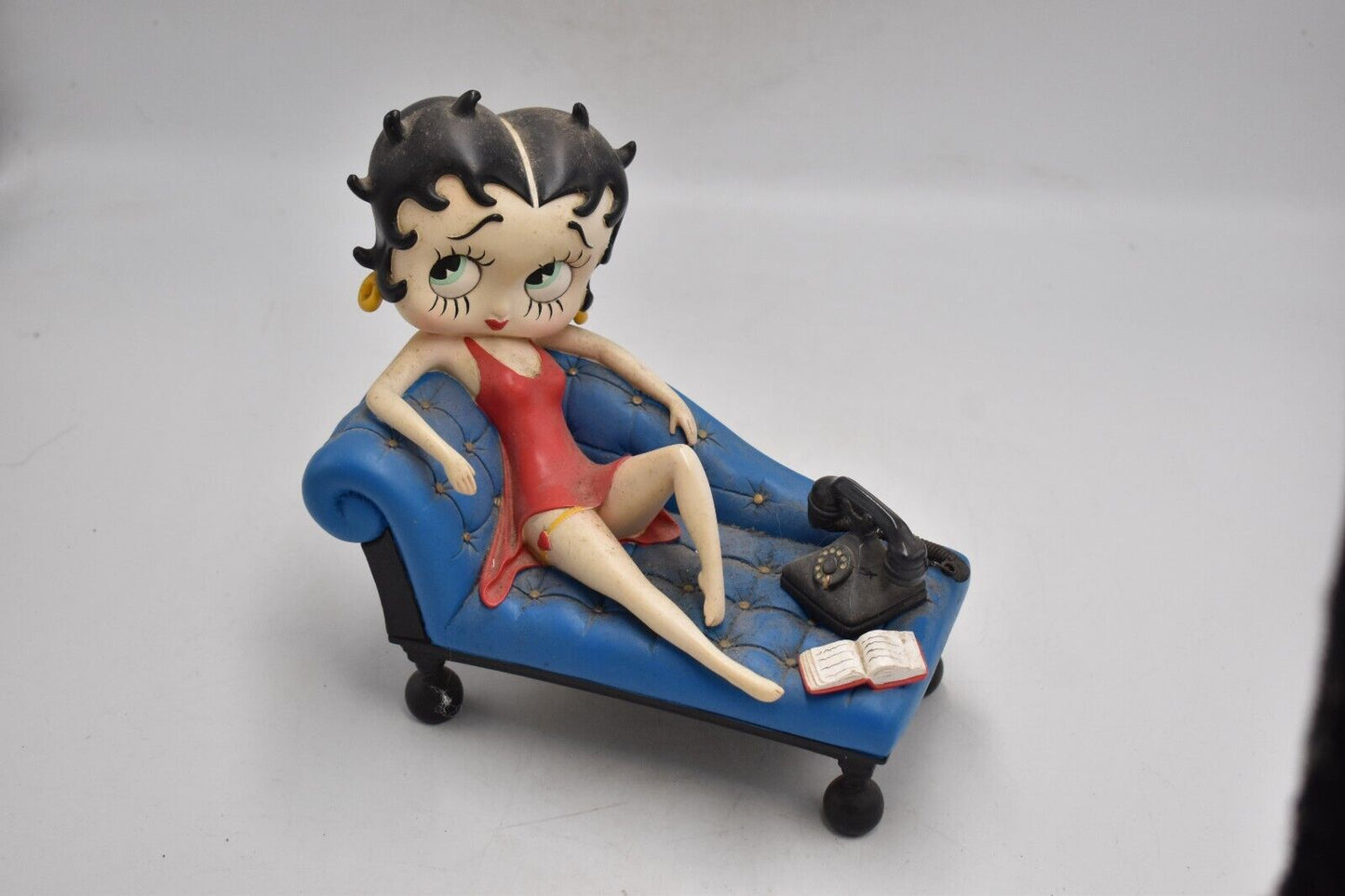 Betty Boop Figurine on Chaise Lounge with Phone & Book – King Features Syndicate