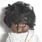 Vintage 1970's Hard Plastic Black Baby Blinking Doll Knitted Cardigan