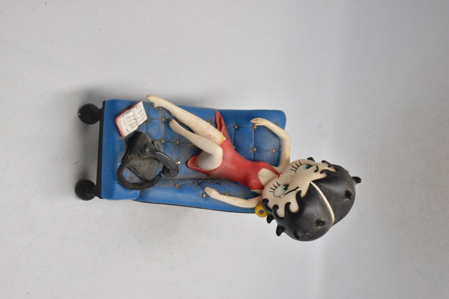 Betty Boop Figurine on Chaise Lounge with Phone & Book – King Features Syndicate