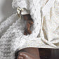 Vintage 1970's Hard Plastic Black Baby Blinking Doll Knitted Cardigan