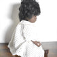 Vintage 1970's Hard Plastic Black Baby Blinking Doll Knitted Cardigan