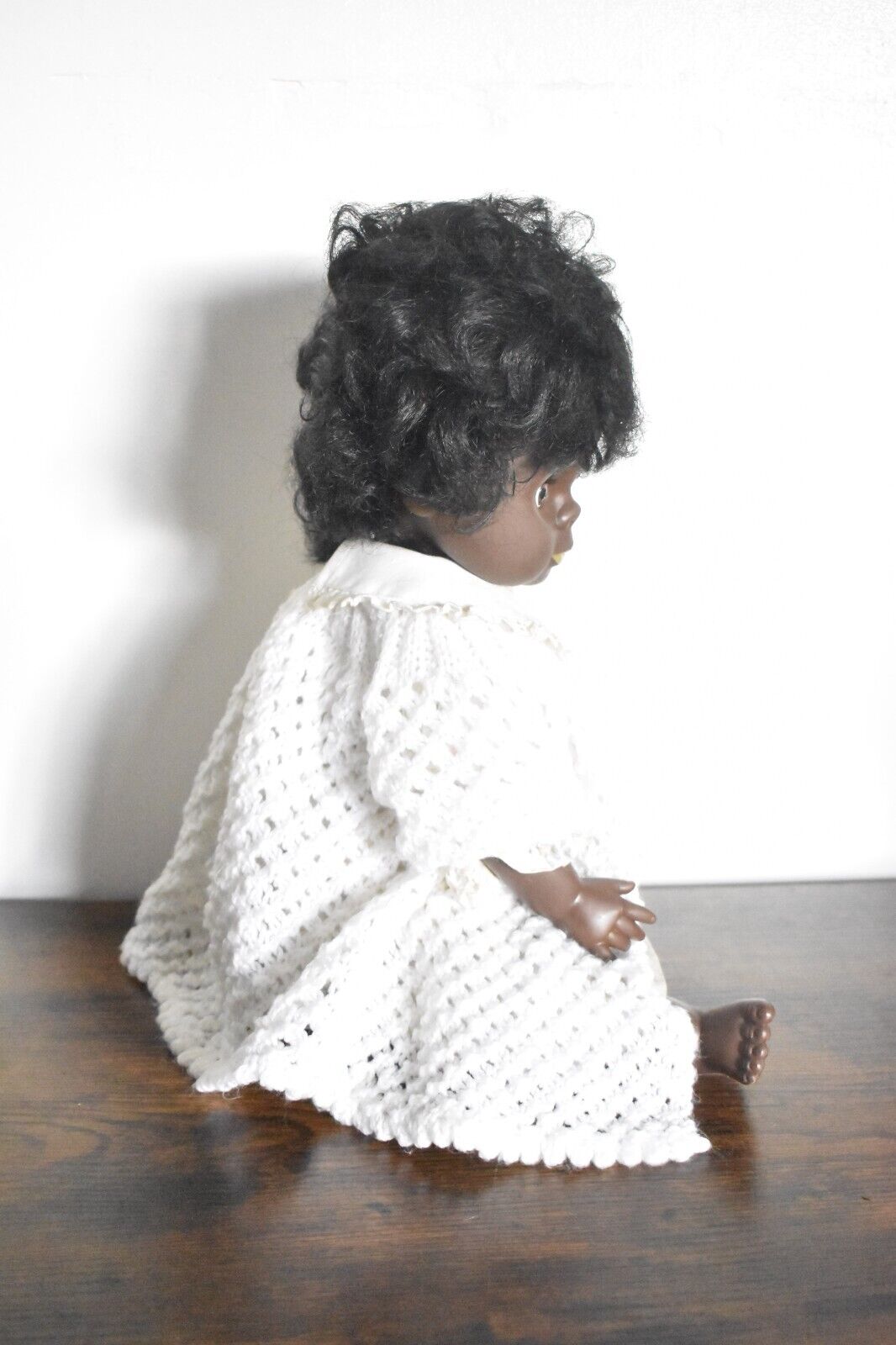 Vintage 1970's Hard Plastic Black Baby Blinking Doll Knitted Cardigan